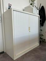Witte dossierkast, Ophalen