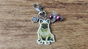 Tashanger Sleutelhanger Franse bulldog met beschermengeltje  beschikbaar voor biedingen