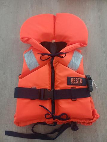 Oranje Besto kinderreddingsvest 20-30 kg - Zo goed als nieuw beschikbaar voor biedingen