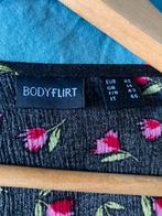 Zwarte Bodyflirt jurk met bloemen - Maat 38/40 (M), Maat 38/40 (M), Zwart, Ophalen of Verzenden, Zo goed als nieuw