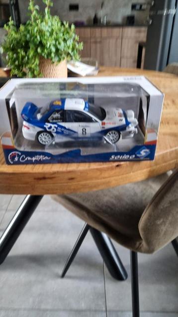1:18 Subaru 555 met lampen bar. beschikbaar voor biedingen