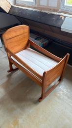 Antieke houten wieg, Ophalen