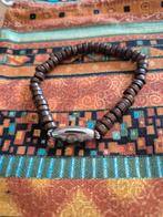Houten kralen armband met zilveren detail, Sieraden, Tassen en Uiterlijk, Armbanden, Bruin, Nieuw, Ophalen of Verzenden, Met bedels of kralen