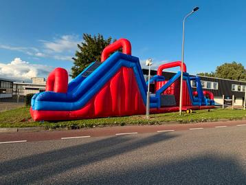 Springkussen Stormbaan XL te huur beschikbaar voor biedingen