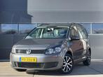 Volkswagen Touran 1.6 TDI Comfortline BlueMotion Navi - Airc, Auto's, Volkswagen, Voorwielaandrijving, Euro 5, Stof, Gebruikt