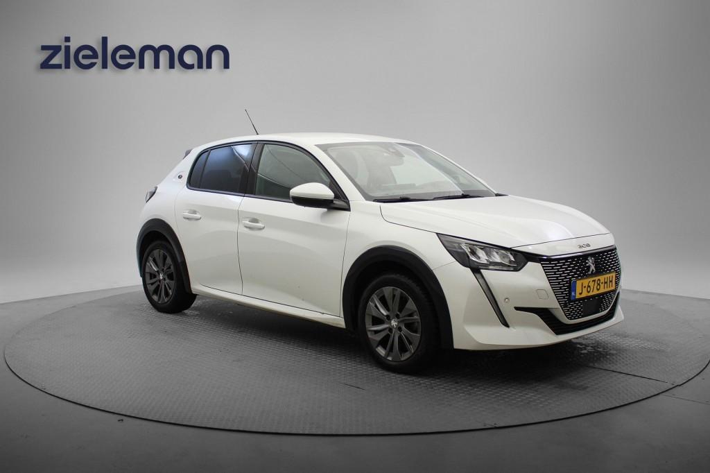 Peugeot E-208 Allure 50 kWh - Digital Cockpit, Carplay, Half, Gebruikt, Met garantie (alle), Wit, Origineel Nederlands