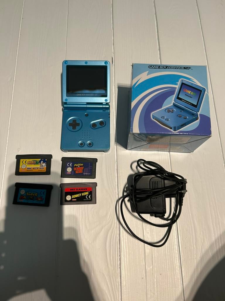 Nintendo gameboy advance sp surf blue met doos en spellen, Spelcomputers en Games, Spelcomputers | Nintendo Game Boy, Ophalen of Verzenden