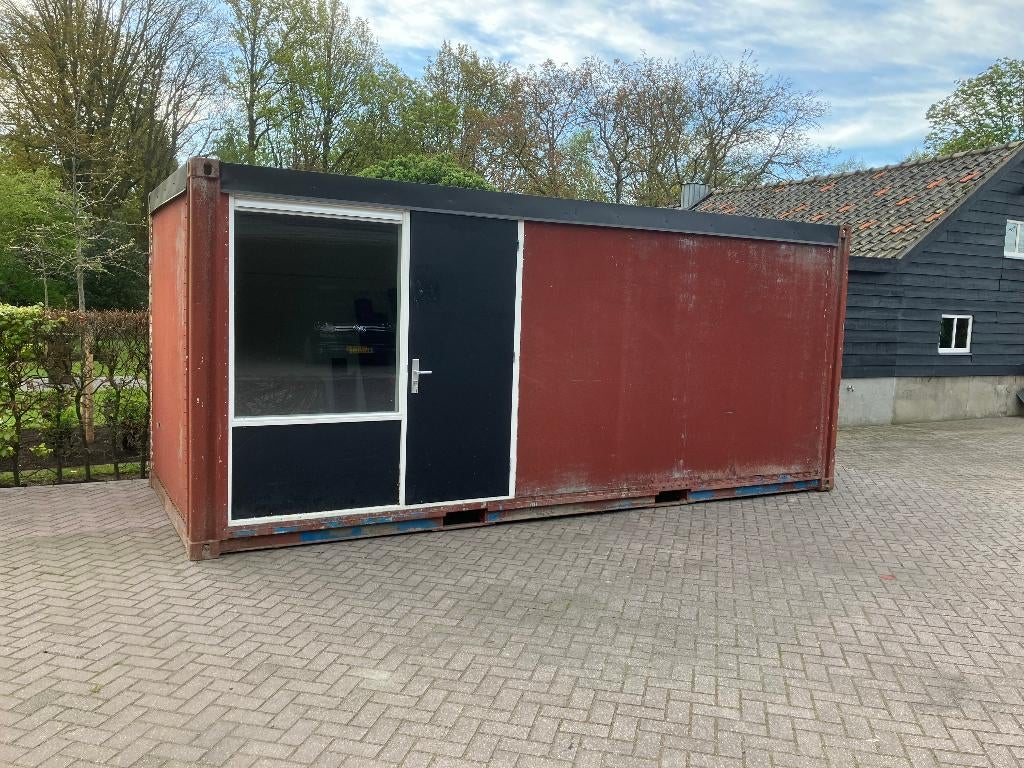 Bouwcontainer schaftcontainer met materiaalopslag, Ophalen