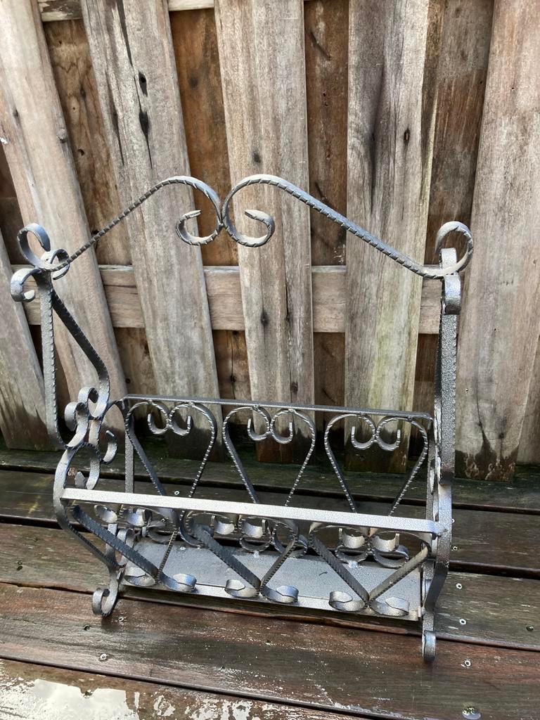 Kranten/lectuur bak, Ophalen