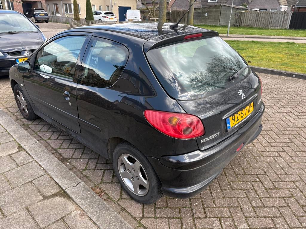 Peugeot 206 1.4 3D 2006 Zwart, Auto's, Peugeot, Voorwielaandrijving, Stof, 4 cilinders, Zwart