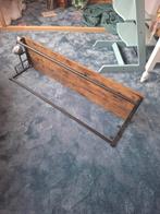 Kapstok met houten plank, Ophalen