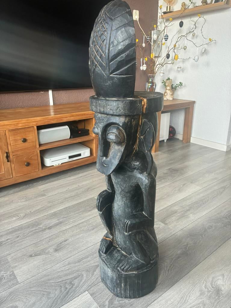 Houten beeld handgesneden, Ophalen