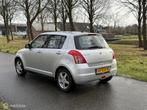 Suzuki Swift 1.3 Comfort*SCHERM*NEW APK 1/27*STOELVERWARMING, Auto's, Voorwielaandrijving, Stof, Zwart, 400 kg