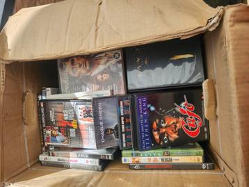 Doos vol dvd's beschikbaar voor biedingen