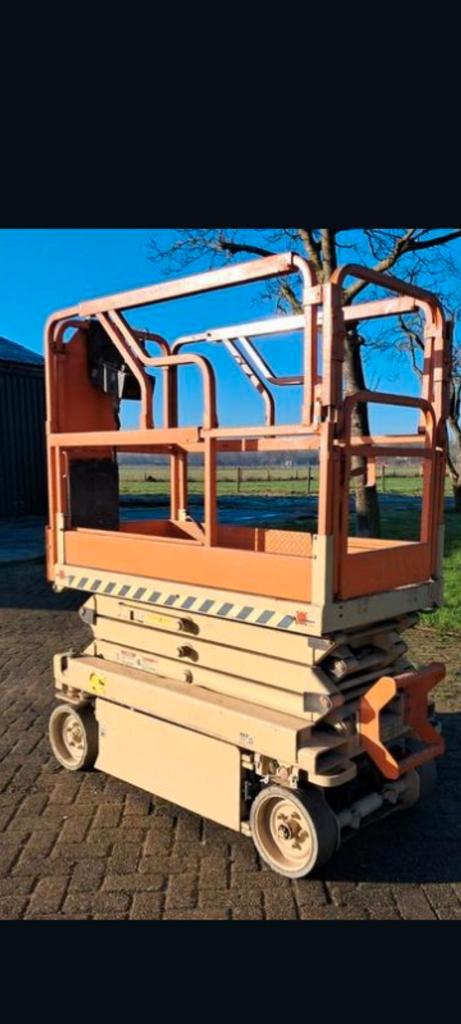 Compacte JLG hoogwerker / schaar hoogwerker te koop, Zakelijke goederen, Machines en Bouw | Liften, Steigers en Ladders, Ophalen
