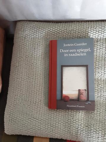 Jostein Gaarder-------Door een spiegel, in raadselen beschikbaar voor biedingen