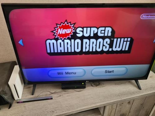 Wii met heel veel spellen en accessoires, Spelcomputers en Games, Spelcomputers | Nintendo Wii, Gebruikt, Met 2 controllers, Met games