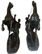 2 bronzen paarden, Ophalen, Brons