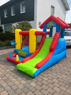 Klein Springkussen met Glijbaan te Huur Dubbel Plezier!, Ophalen of Verzenden, Zo goed als nieuw