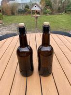 Twee bierflessen van Grolsch, Ophalen