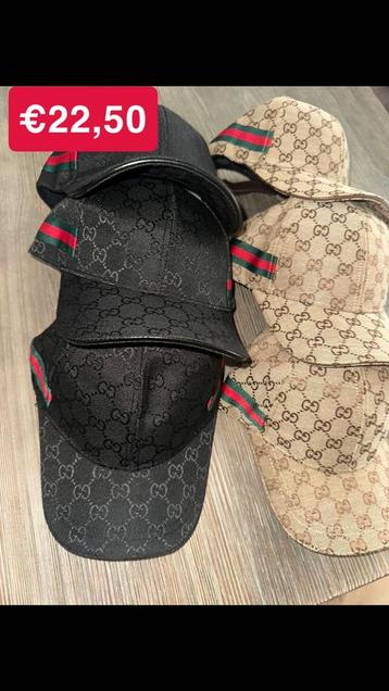 Zwarte gucci petten beschikbaar voor biedingen