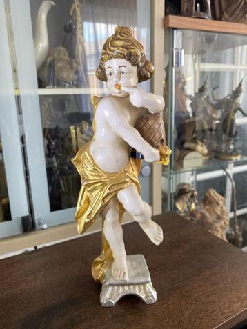 Oude gekleurde houten figuur putte engel honing licker beschikbaar voor biedingen