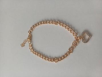 Goudkleurige armband beschikbaar voor biedingen