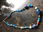 Ketting met vooral blauwe kralen en een amberkleur. LDADPR, Overige materialen, Verstelbaar, Blauw, Ophalen of Verzenden