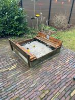 Houten zandbak met kapotte plank, Ophalen, Gebruikt