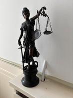 Bronzen vrouwe justitia, Ophalen, Gebruikt, Mens