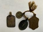 4 Heilige Medaillons, Ophalen