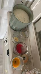 Gratis kaarsen af te halen, Ophalen