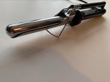 Babyliss kappers krultang met roterend snoer en haarklem beschikbaar voor biedingen