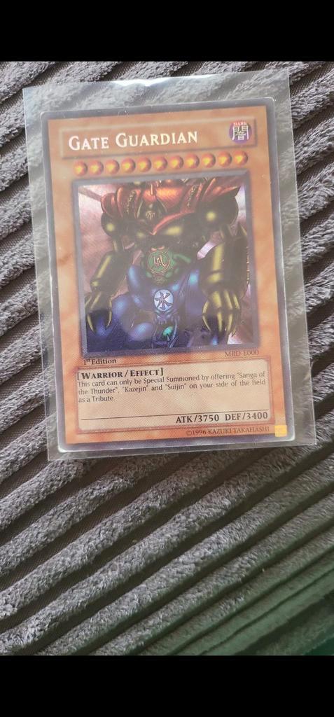 Gate guardian mrd-000 1st edition, Hobby en Vrije tijd, Verzamelkaartspellen | Yu-gi-Oh!, Zo goed als nieuw, Losse kaart, Foil