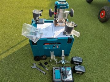 Makita freesmachine DRT50ZJX2 18Volt 2x accu + lader beschikbaar voor biedingen