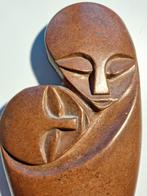 Stenen beeldje moeder met kind, Ophalen