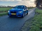 BMW 1-Serie 3.0 M135i 3DR AUT 2012 Blauw, Achterwielaandrijving, 74 €/maand, Zwart, Alcantara