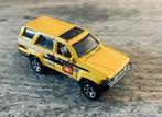 Matchbox Toyota 4Runner 1985 - Geel 1:64, Ophalen, Gebruikt, Auto