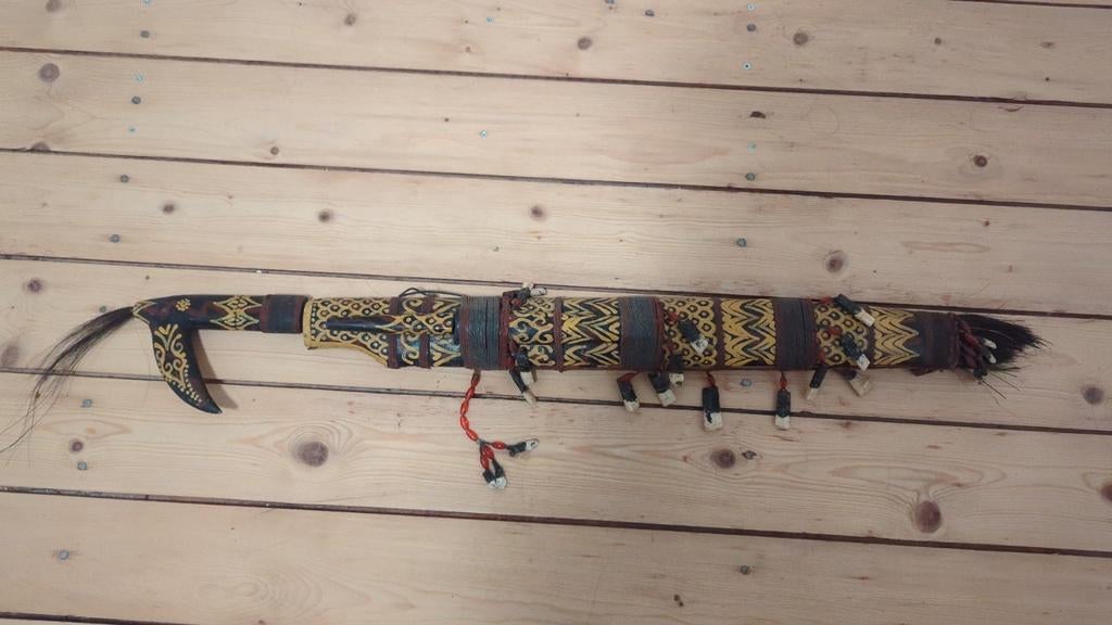 Mandau zwaard, Ophalen