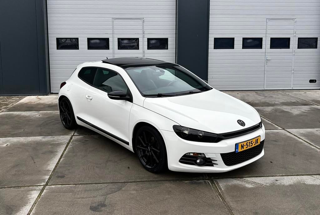 Volkswagen Scirocco 1.4 TSI  2010 Panoramadak, Voorwielaandrijving, Zwart, 4 cilinders, 4 stoelen