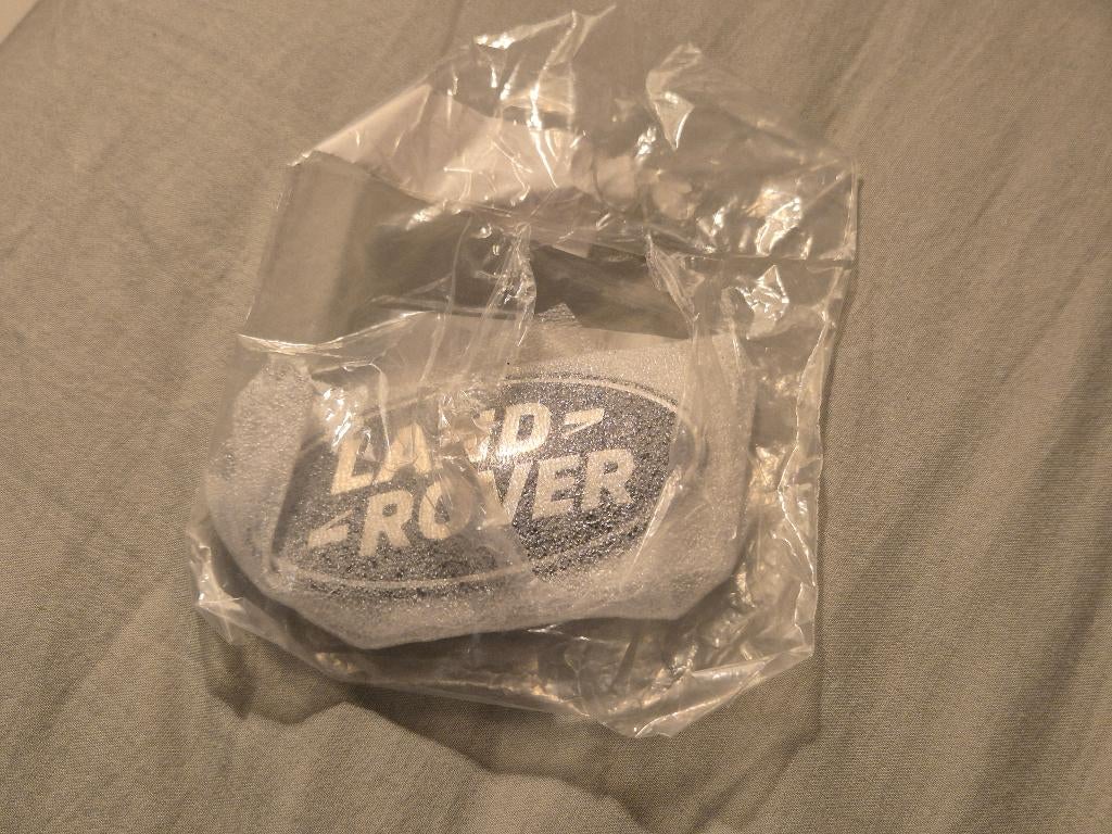 Long Rover emblem original LR053190, Ophalen of Verzenden, Nieuw, Rover