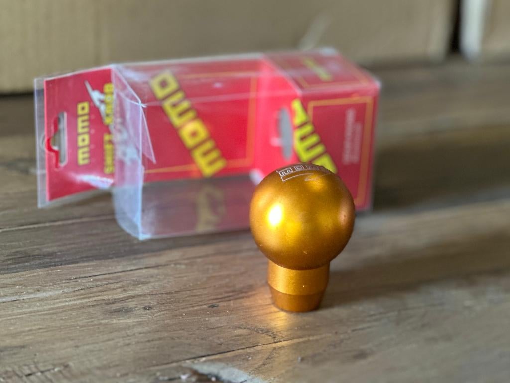 Momo pook schakelpook goud geel universeel