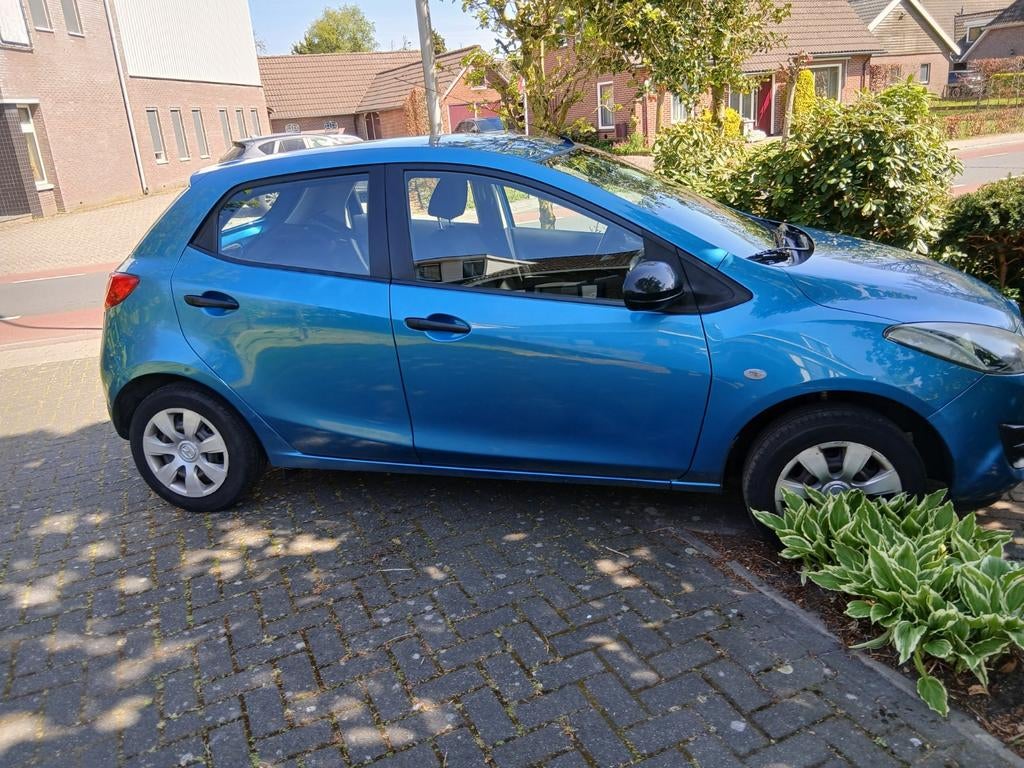 Mazda 2 1.3 75pk 5D 2011 Blauw, Auto's, Mazda, Voorwielaandrijving, Stof, 74 pk, 4 cilinders