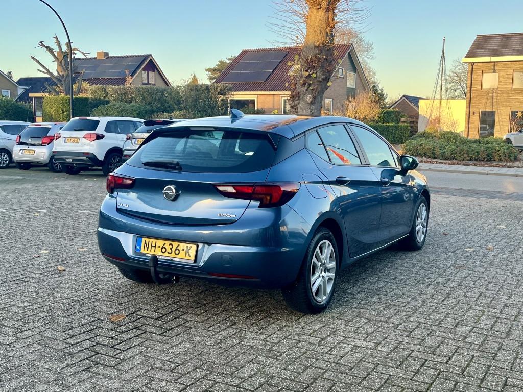 Opel Astra 1.0 105PK Online Edition Automaat Camera Navigati, Auto's, Gebruikt, Blauw, 610 kg, 23 km/l
