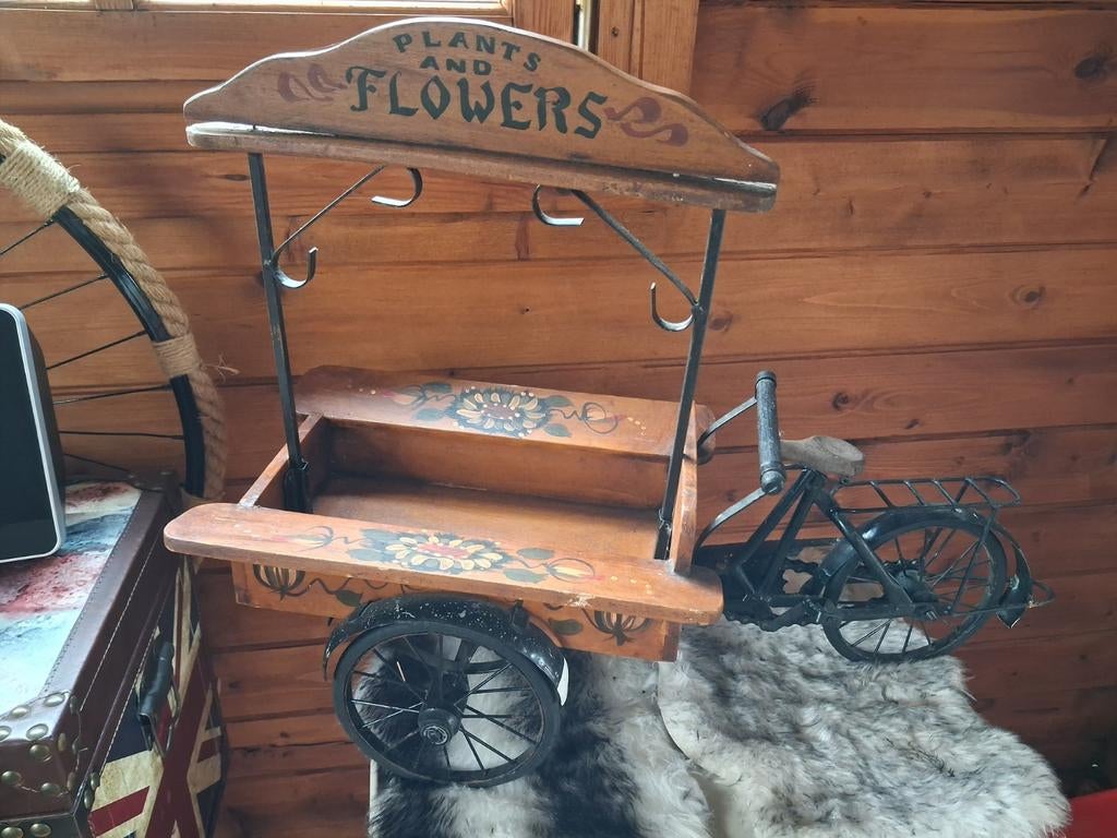 Antieke speelgoed bakfiets, Ophalen