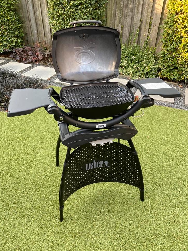 Weber Q1200 met standaard - splinternieuw, Tuin en Terras, Gasbarbecues, Zo goed als nieuw, Ophalen