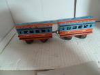Twee blikken passagiers wagon spoor 0, Ophalen of Verzenden