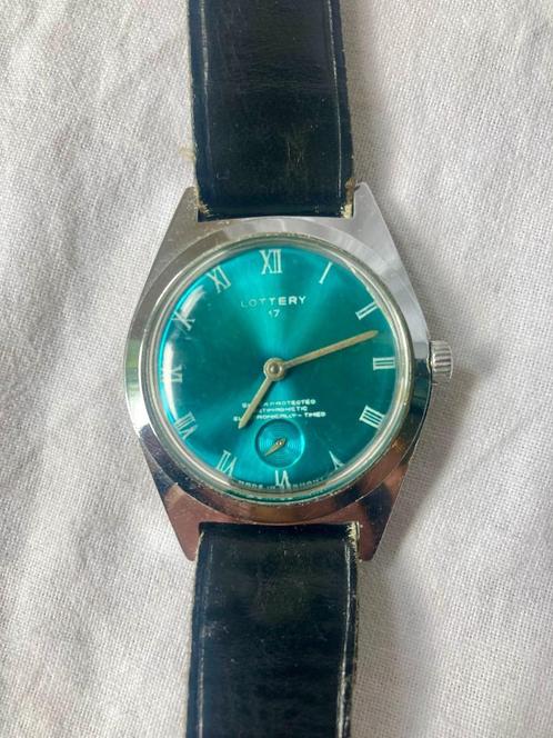 Lottery 17 Horloge Duitsland Jaren 70, Sieraden, Tassen en Uiterlijk, Horloges | Heren, Gebruikt, Polshorloge, Overige merken