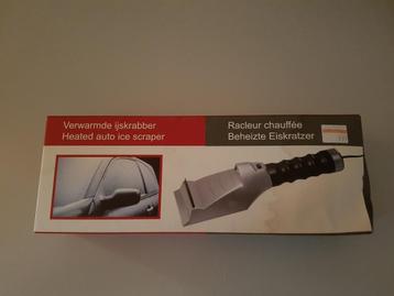 Verwarmde ijskrabber nieuw in doos beschikbaar voor biedingen