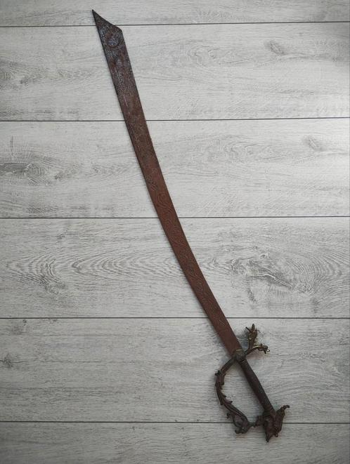 Antiek ogend zwaard met drakenkop handvat. Oosters., Antiek en Kunst, Antiek | Overige Antiek, Ophalen of Verzenden